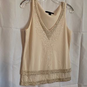 Cream sleeveless blouse by Express, size L